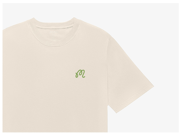 Malbon beige T-shirt front graphic detail