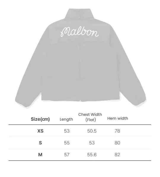 Malbon women hooded golf windbreaker pocket and hem detail