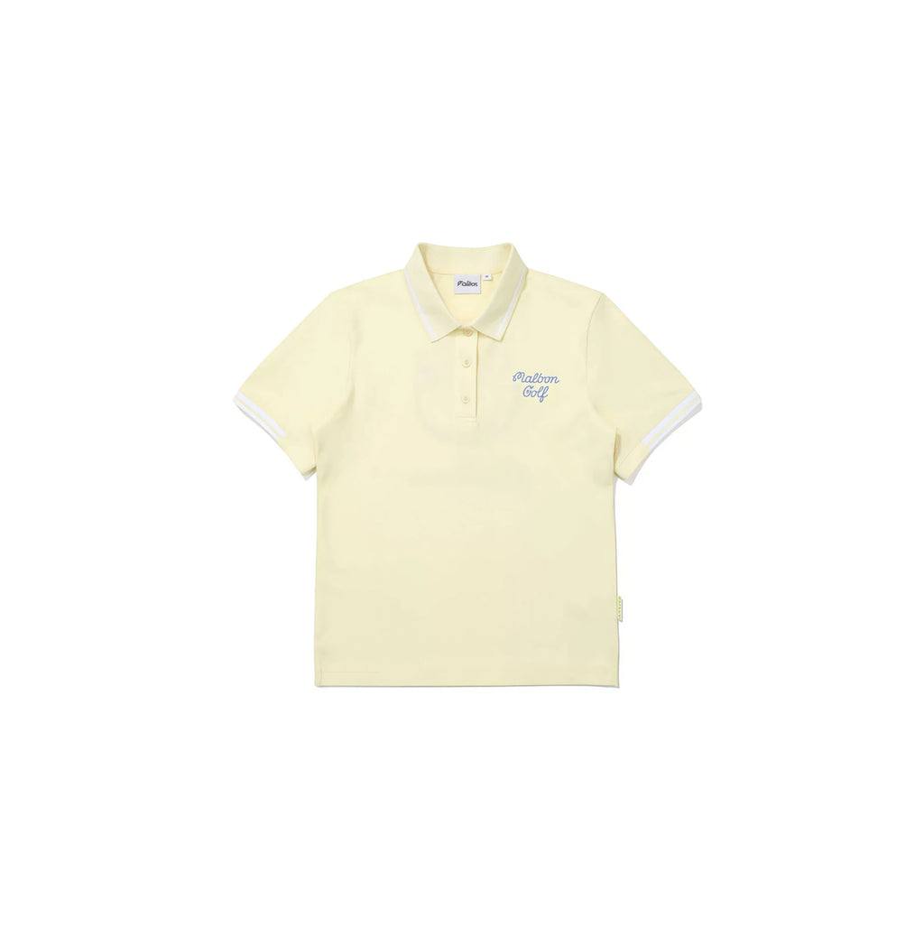 Malbon women's quick-dry breathable golf polo in pale yellow with white collar tipping and cursive Malbon Golf embroidery