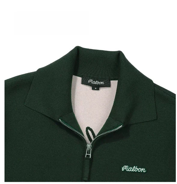 Malbon women's zip-up casual golf jacket — embroidered logo close-up