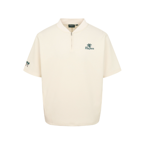 Malbon women's Loose Fit Quarter-Zip Casual Golf Shirt in White, front view