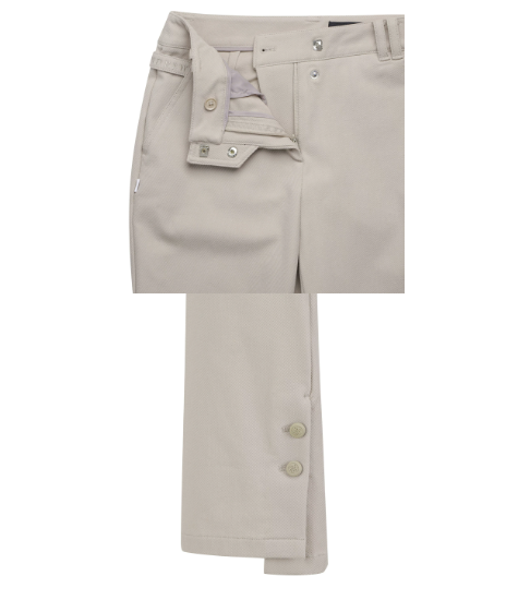 St Andrews Women's Slim-Fit Flare Golf Pants — model on course wearing styled flare pant