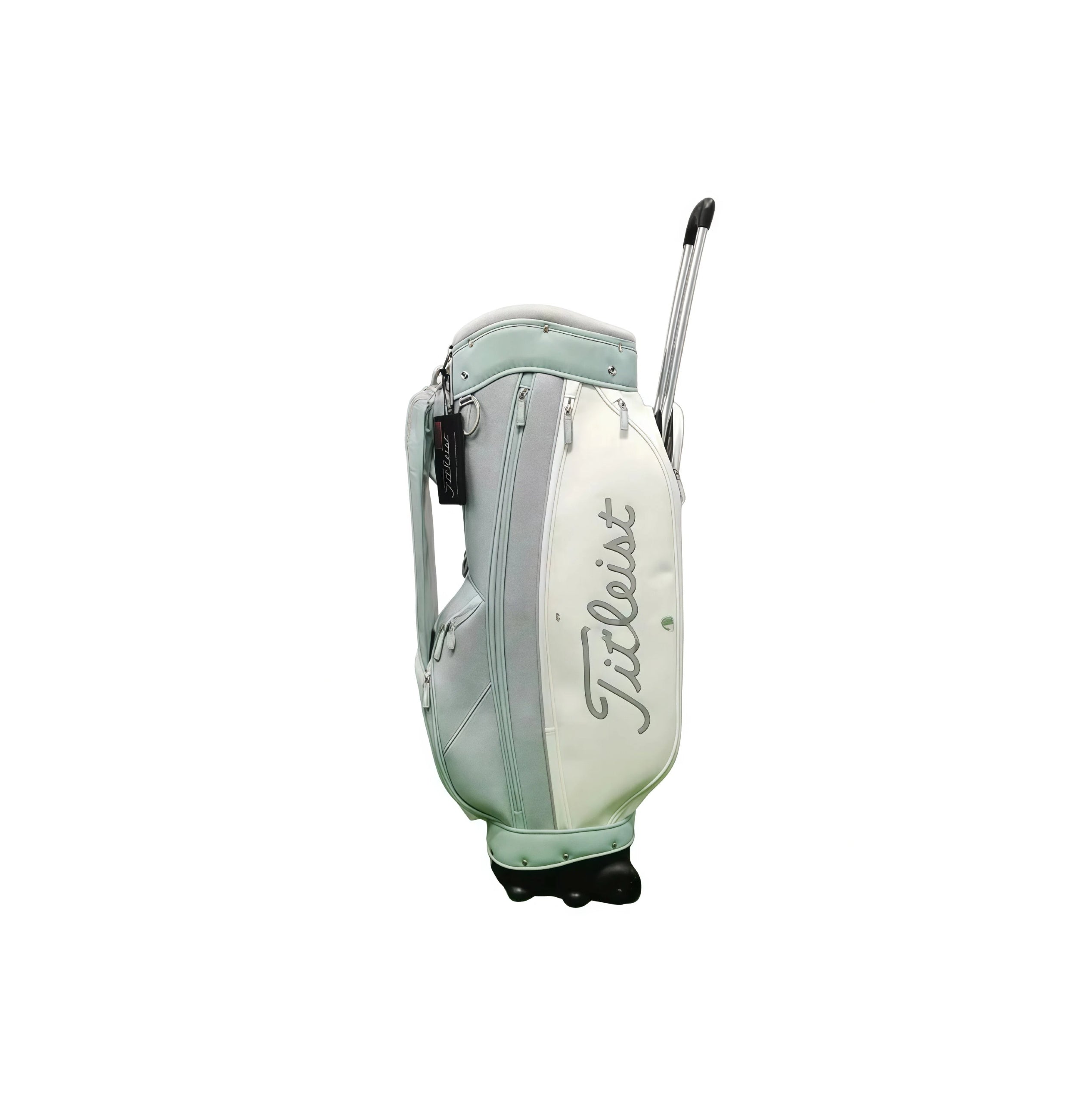 Mint and cream Titleist waterproof cart golf bag, side view with extended pull-rod handle and script logo