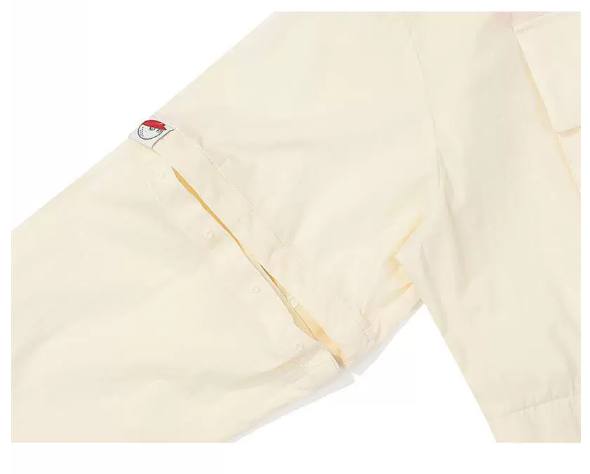 Malbon Women's Convertible Lightweight Golf Jacket Beige lightweight golf jacket detail view