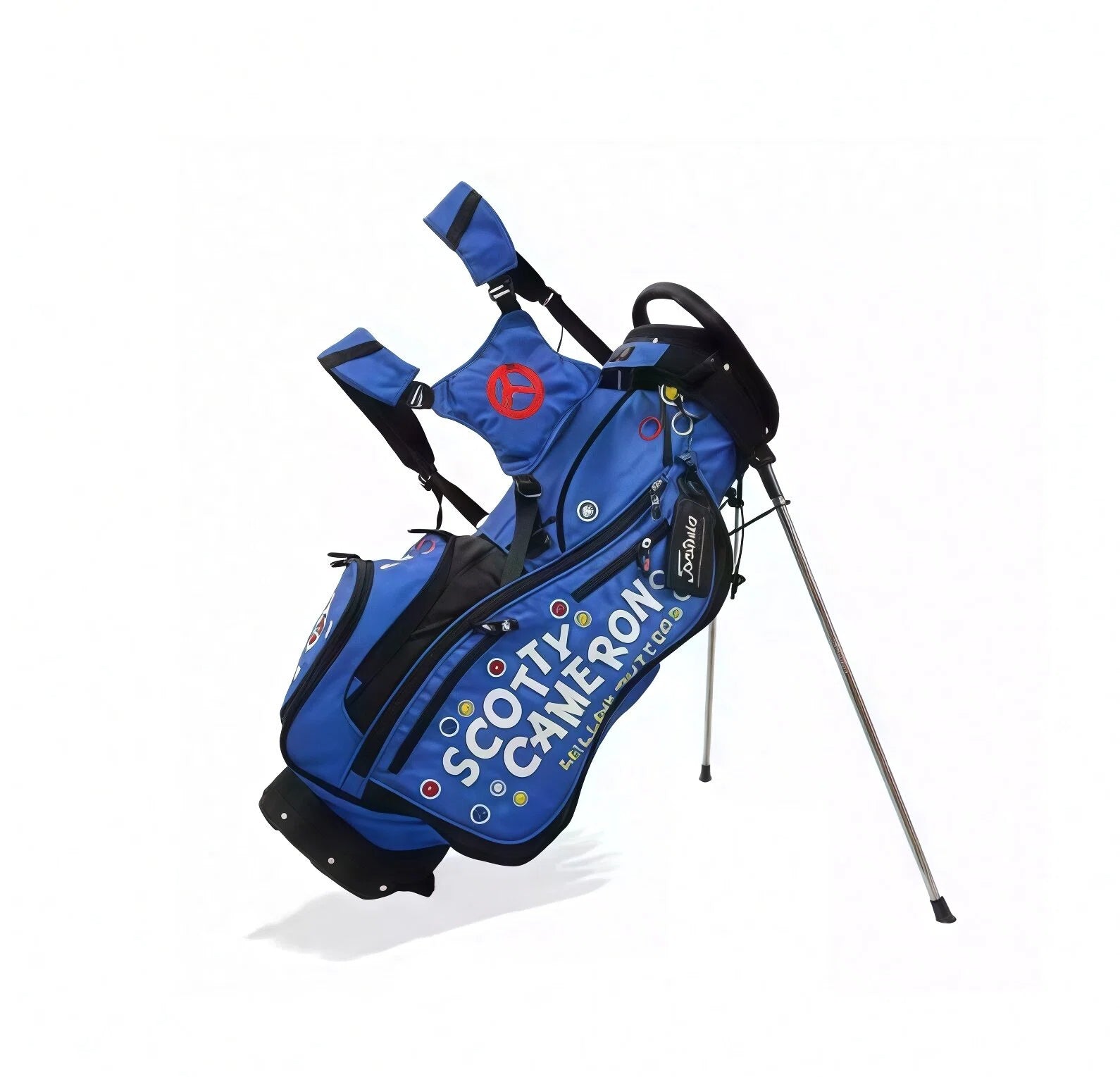 Royal blue Scotty Cameron golf stand bag with red logo, colorful dot pattern, multiple pockets, and dual shoulder straps – built for comfort and performance on the course.