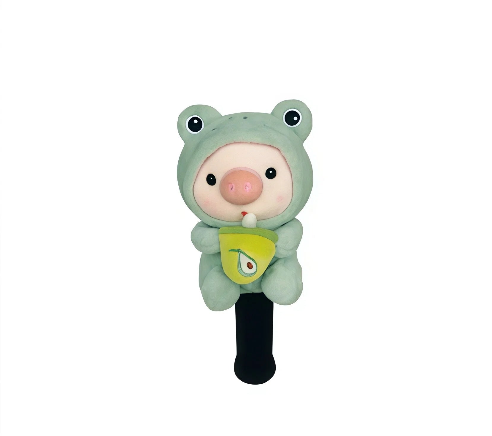 Front view of a green frog-themed plush golf headcover featuring a cute pig character in a frog costume, holding a yellow cup with an avocado print, designed for club protection and fun style.
