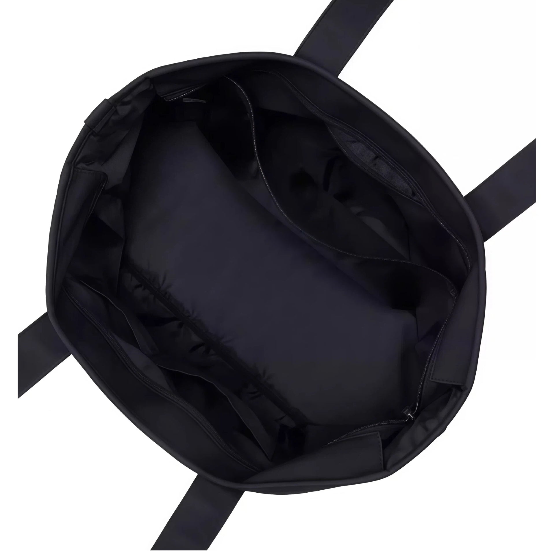 Top-down view of the TaylorMade Black Golf Tote’s interior, showcasing a spacious main compartment with multiple pockets and padded sections for organized storage.