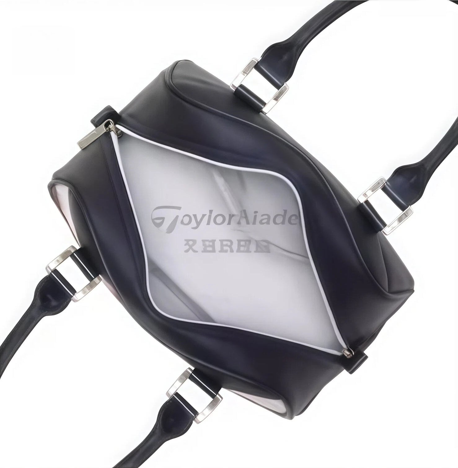 Interior shot of the TaylorMade Women’s Golf Tote showing a spacious, light-gray lined main compartment with a subtle "TaylorMade" logo print. Designed for organized storage of golf essentials or daily items