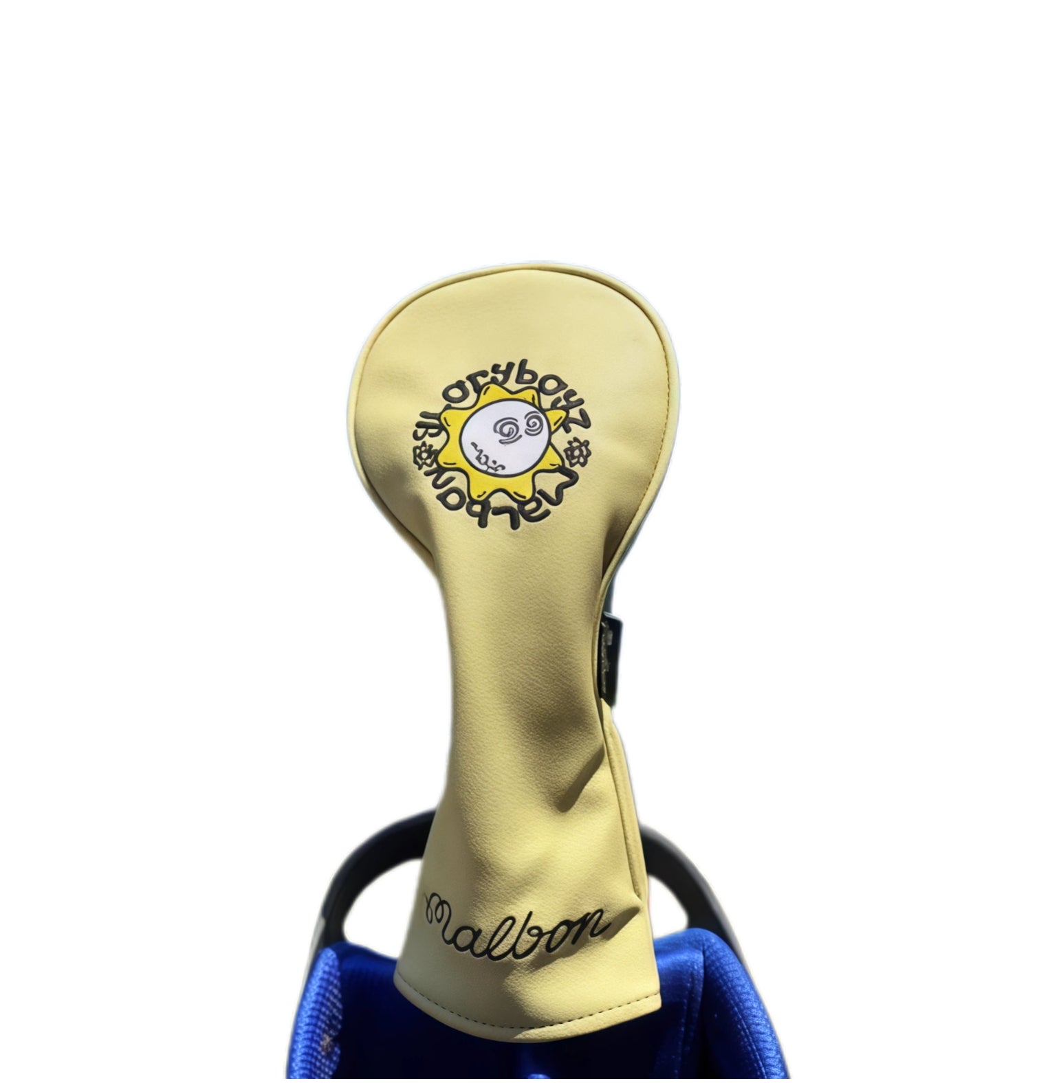 Beige Malbon Golf driver headcover with a minimalist sunflower design and circular "Malbon" logo — durable, lightweight protection for your driver with a cheerful, modern aesthetic.
