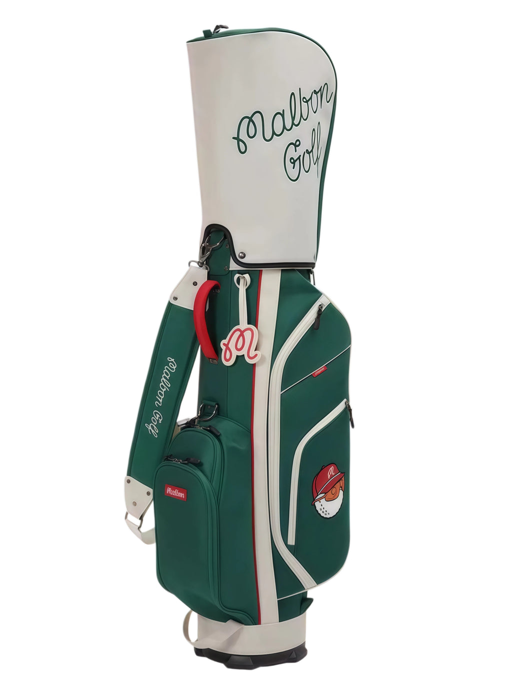 Full side profile of Malbon Golf Heritage stand bag in green, showcasing adjustable shoulder strap, cartoon golf ball mascot, and embroidered “Malbon Golf” branding