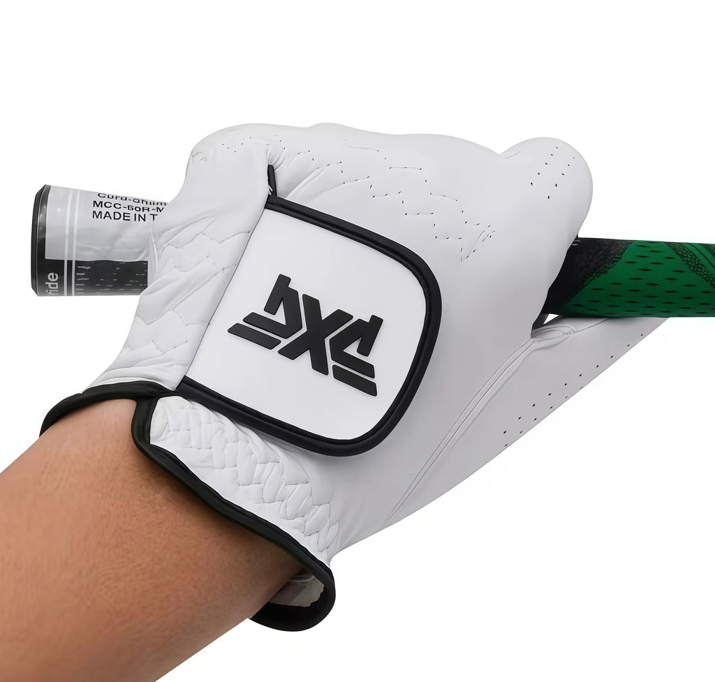 Golfer's left hand wearing a white PXG Tour glove gripping a golf club, demonstrating the superior fit, flexibility, and non-slip grip of the synthetic leather material.