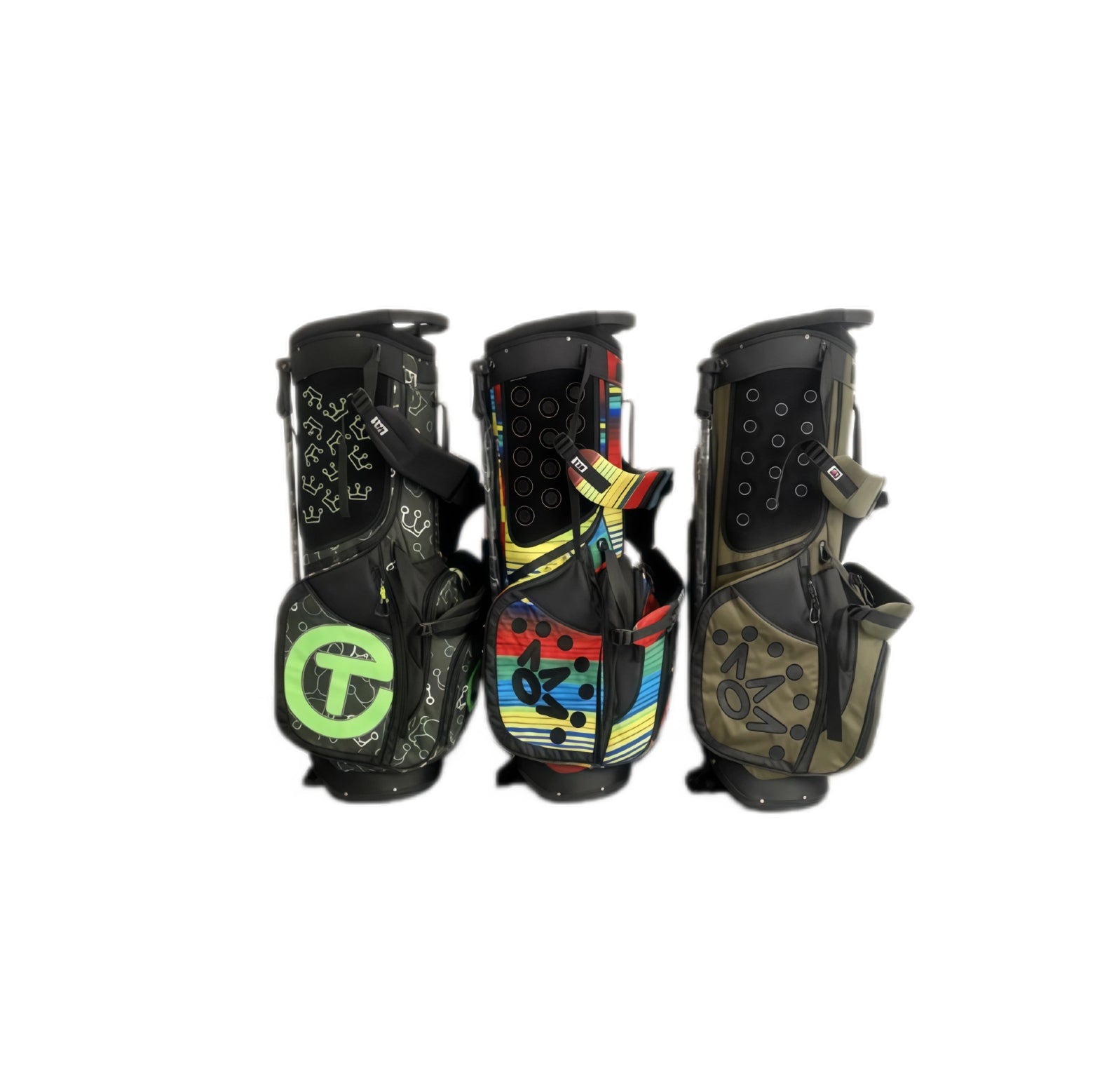 A front view displaying three Scotty Cameron Junior stand bags side-by-side. The collection features the colorful Serape pattern in the center, flanked by a black bag with a crown motif and a solid olive green bag, all showcasing the Circle T logo.