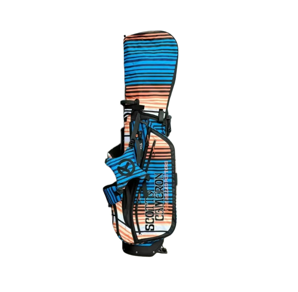 A rear angled view of the Scotty Cameron Sunset Serape stand bag, providing a clear look at the back panel, strap attachments, and the Circle T logo on the lower pocket.