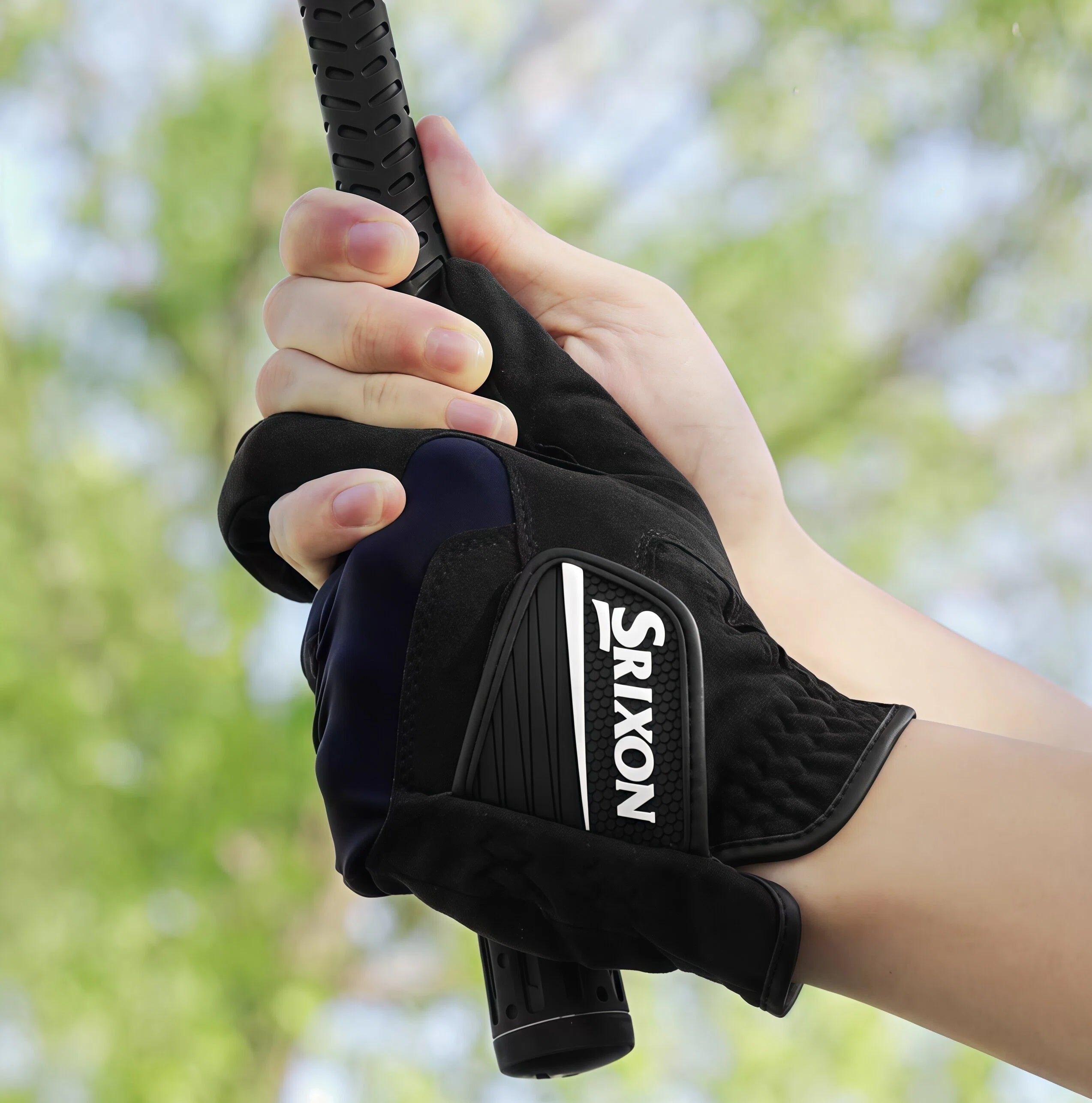 Srixon rain golf glove gripping a golf club, demonstrating water-resistant performance and secure hold for consistent swings in wet conditions.