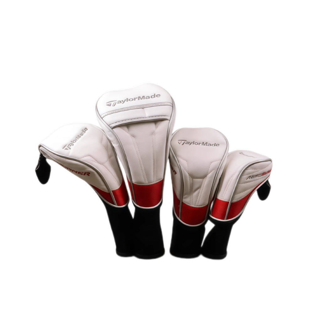 TaylorMade golf headcover set featuring white and red synthetic leather covers for driver, fairway wood, and hybrid clubs — premium design with quilted stitching, black stretch sleeves, and "TaylorMade" branding for optimal club protection.
