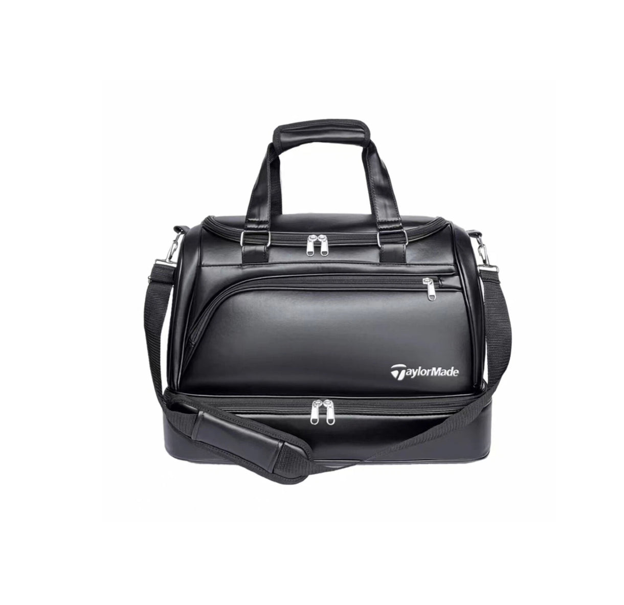 Front view of the black TaylorMade TM24 Authentic Boston bag showcasing its structured design, silver zippers, and detachable crossbody strap. Features multiple compartments and durable synthetic leather construction for everyday use.