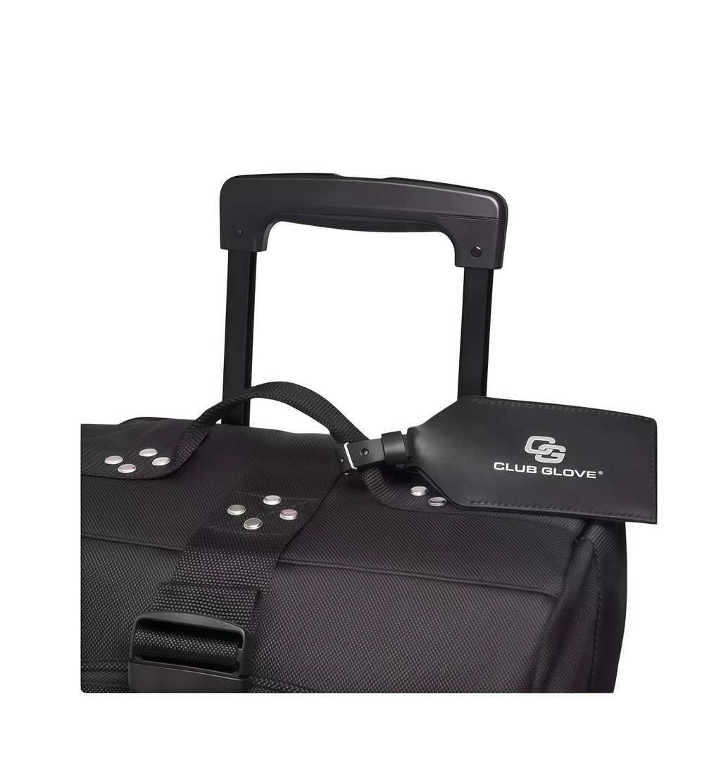 Top view of the black Titleist Club Mini Rolling Duffle Bag with extended telescopic handle and Club Glove luggage tag. Features durable straps and metal rivets for added strength.