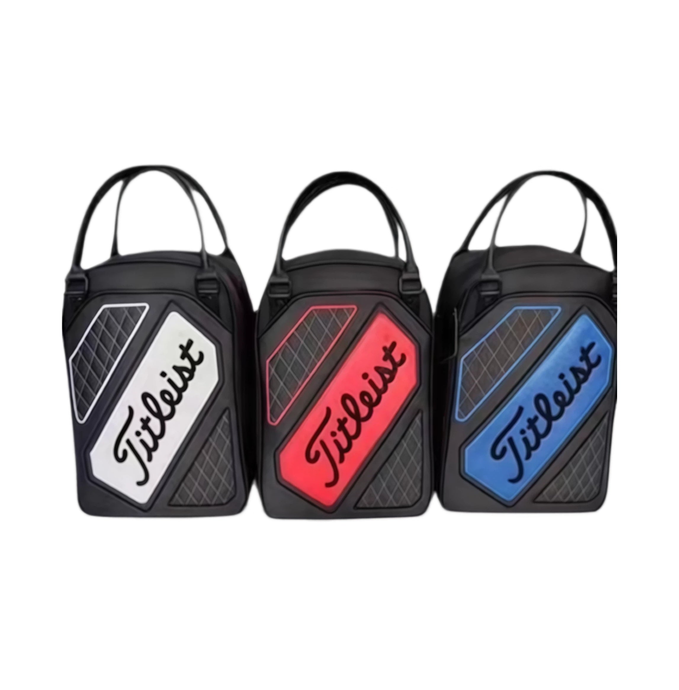Three-color display of the Titleist Quilted Golf Tote Bag showing white, red, and blue logo panels on a black base. Each features quilted diamond stitching, dual handles, and premium branding. Ideal for golfers who want style and utility.