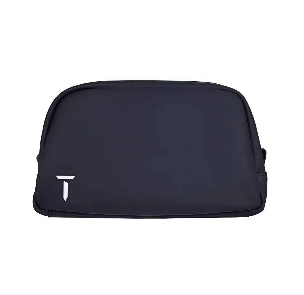 Top-down view of the black European Tour accessory pouch showing the centered white "T" logo and clean stitching. Designed for compact, organized storage.
