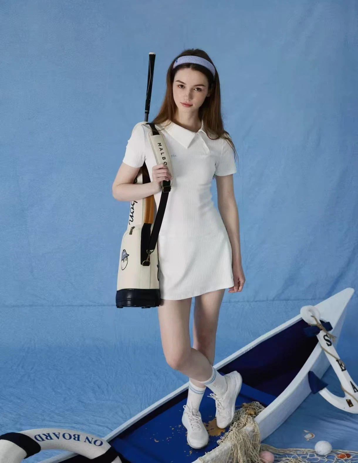 NowRose White golf outfit with golf bag