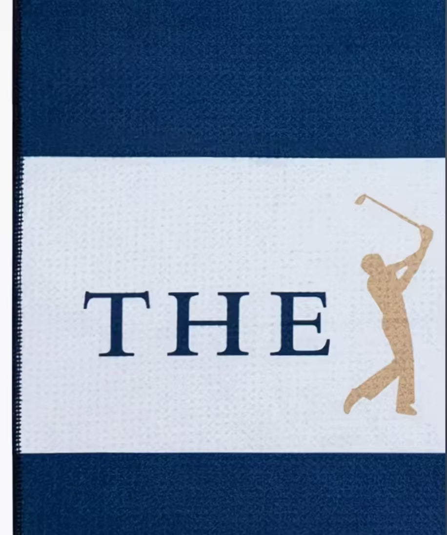 Malbon Blue Microfiber Golf Towel — wiping a golf clubface