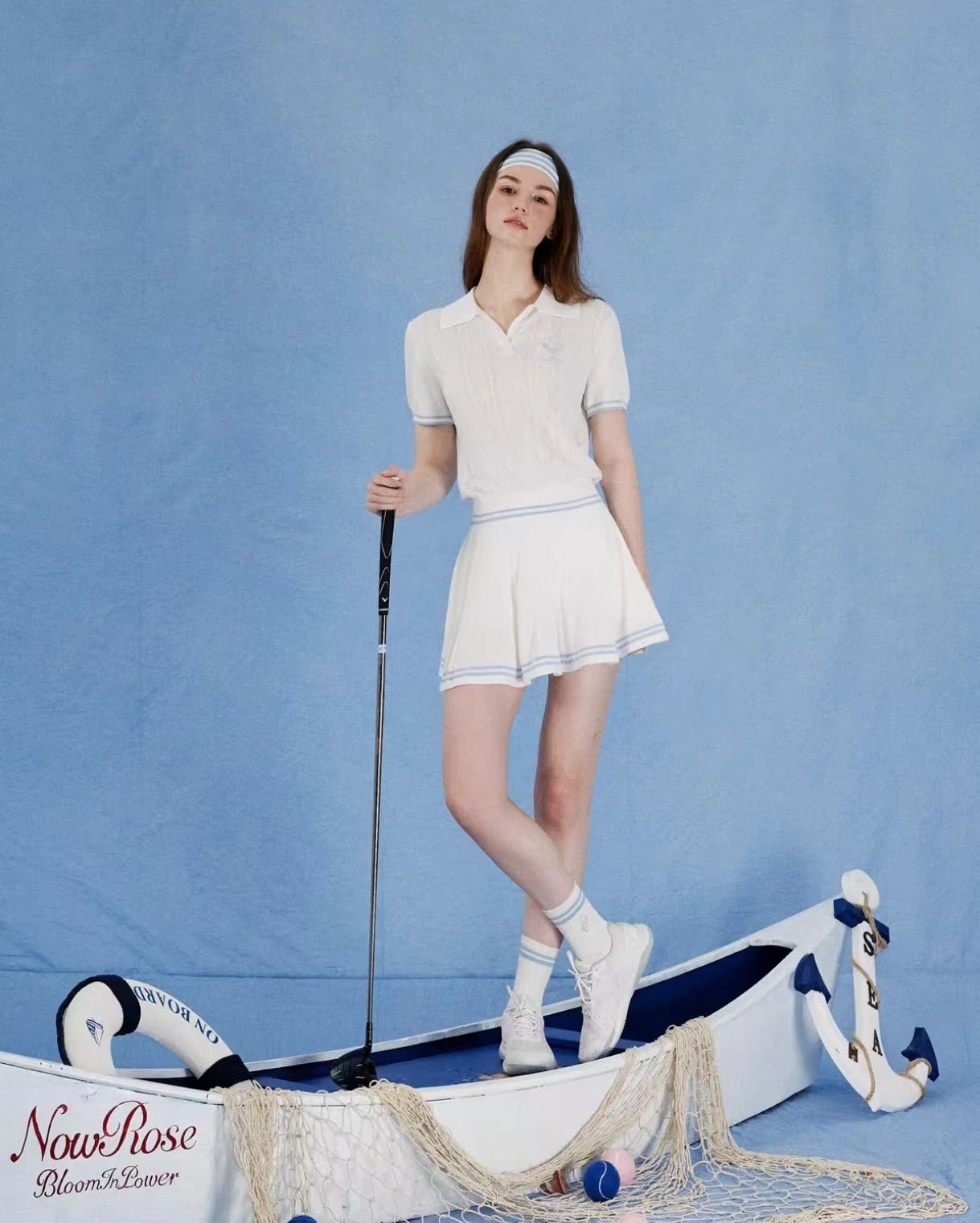 NowRose White cooling golf polo and A-line skirt on model